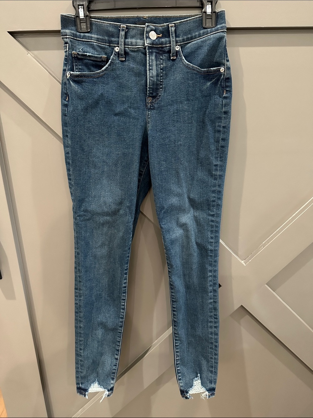 Express Mid Rise Dark Wash Ripped Hem Skinny Jeans
